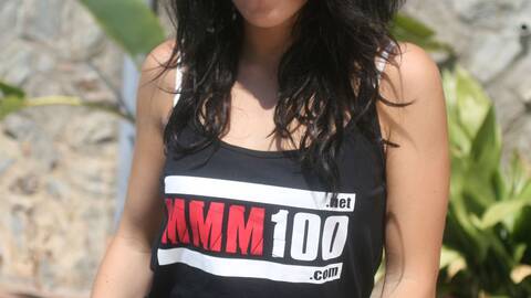 Horny young brunette Jordanne Kali doing a strip wearing MMM100 Tshirt 