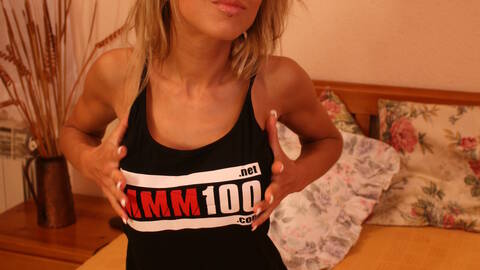 Nice blonde Alexia Vendome doing a hot striptease wearing MMM100 Tshirt 