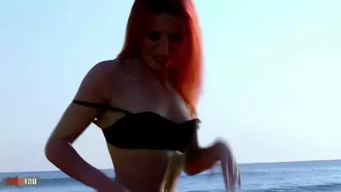 Little redhead removing her clothes at the beach photo 06