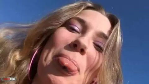 Wunderschöne junge Blondine mit großen Titten Calia B zieht sich am Strand aus photo 02