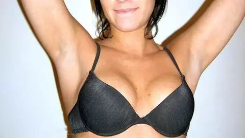 Pretty little brunette Chili doing a hot striptease  photo 5