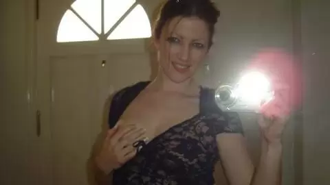 Brunette touching herself 