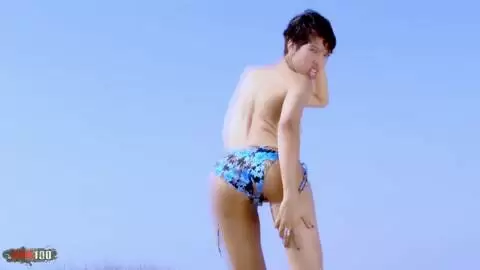 Pretty young arab brunette Jasmine Arabia dancing and stripping on the beach  photo 05