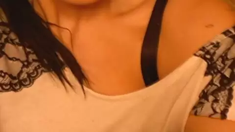 Petite brunette removing her clothes  photo 14