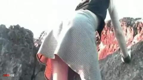 Blonde stripping at the beach photo 02