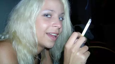 Pretty little blonde Karina doing a hot striptease  photo 3