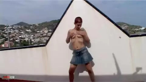 Horny Katia stripping on the terrace  photo 11