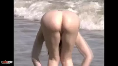 Lovely redhead Mahylis doing a strip on the beach  photo 06