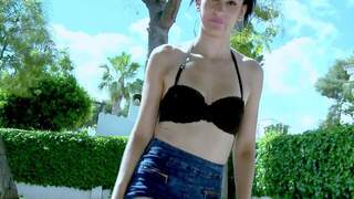 Brunette masturbating at the p