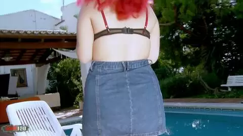 Teen redhead doing a strip at the pool photo 04