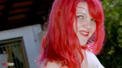 Teen redhead doing a strip at the pool photo 16