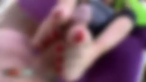 Hot Milf doing footjob while smoking