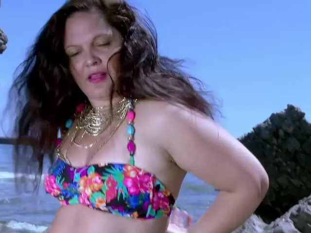 Mature having fun by the beach photo 1