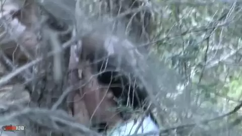 Voyeur clip of a girl blowing her BF in the forest photo 02