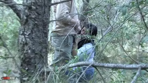Voyeur clip of a girl blowing her BF in the forest photo 12